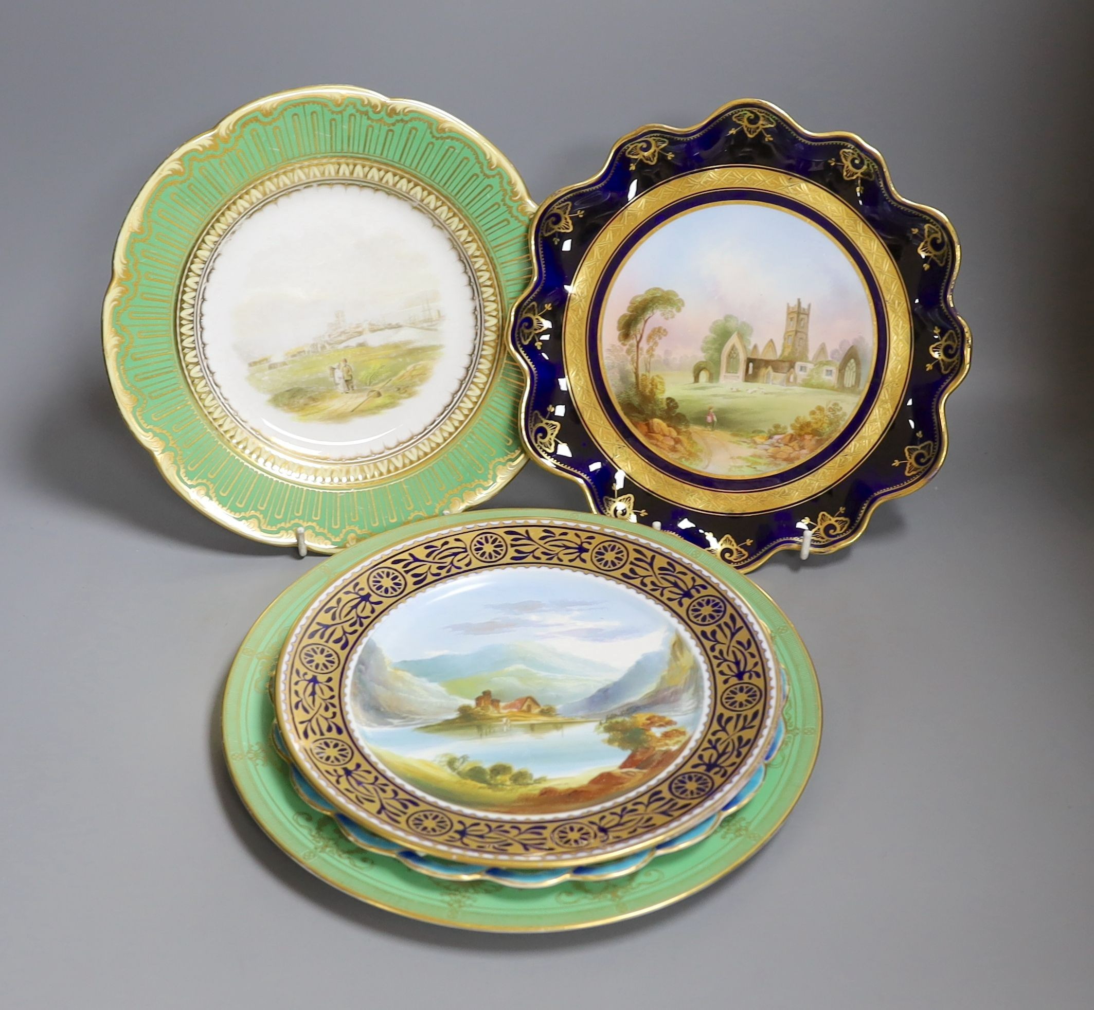 Four English porcelain topographical painted plates, to include Coalport, Royal Worcester and a similar (5)